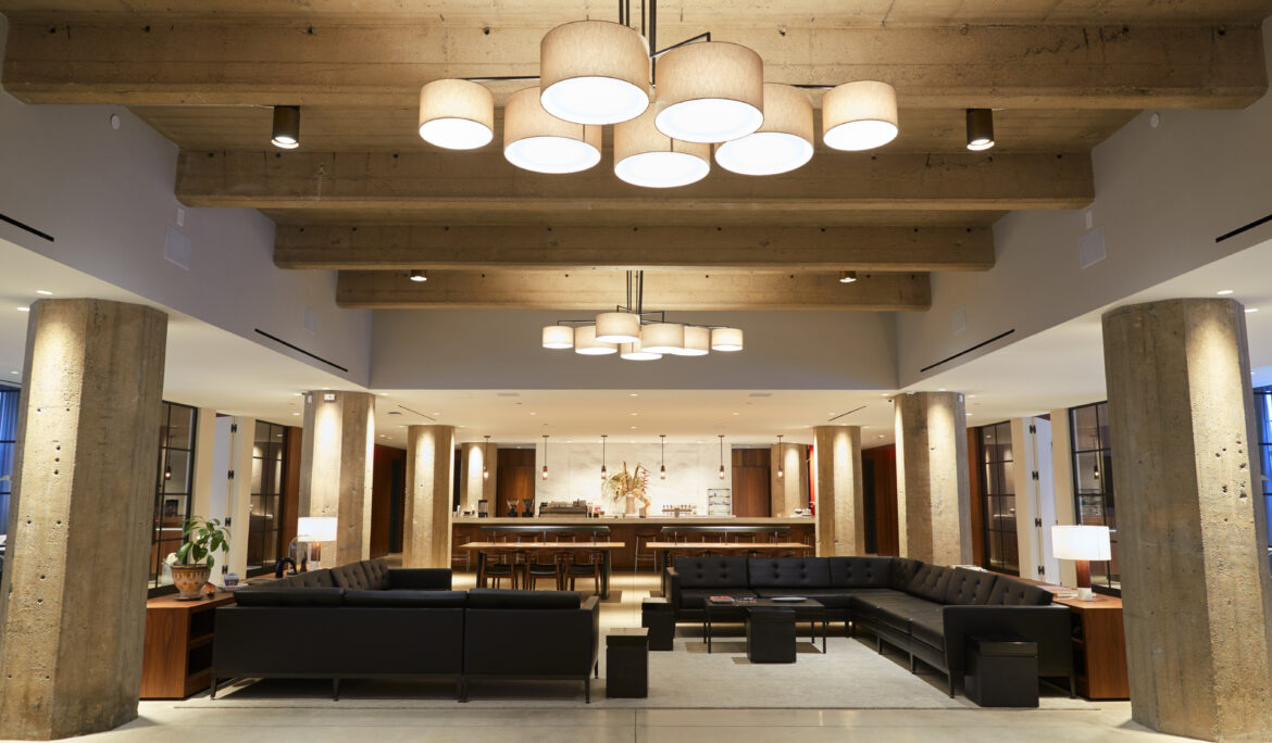 Elegant hotel lounge interior design with modern seating, ambient lighting, and luxurious décor by Decor Interior