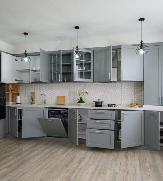 Modern kitchen interior with sleek cabinets, stylish lighting, and functional layout by Decor Interior